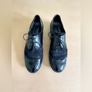 Mirror black with suede detailing sneakers